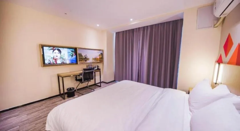 Bed in Borrman Hotel Guilin High-speed Railway North Station Evergrande Plaza