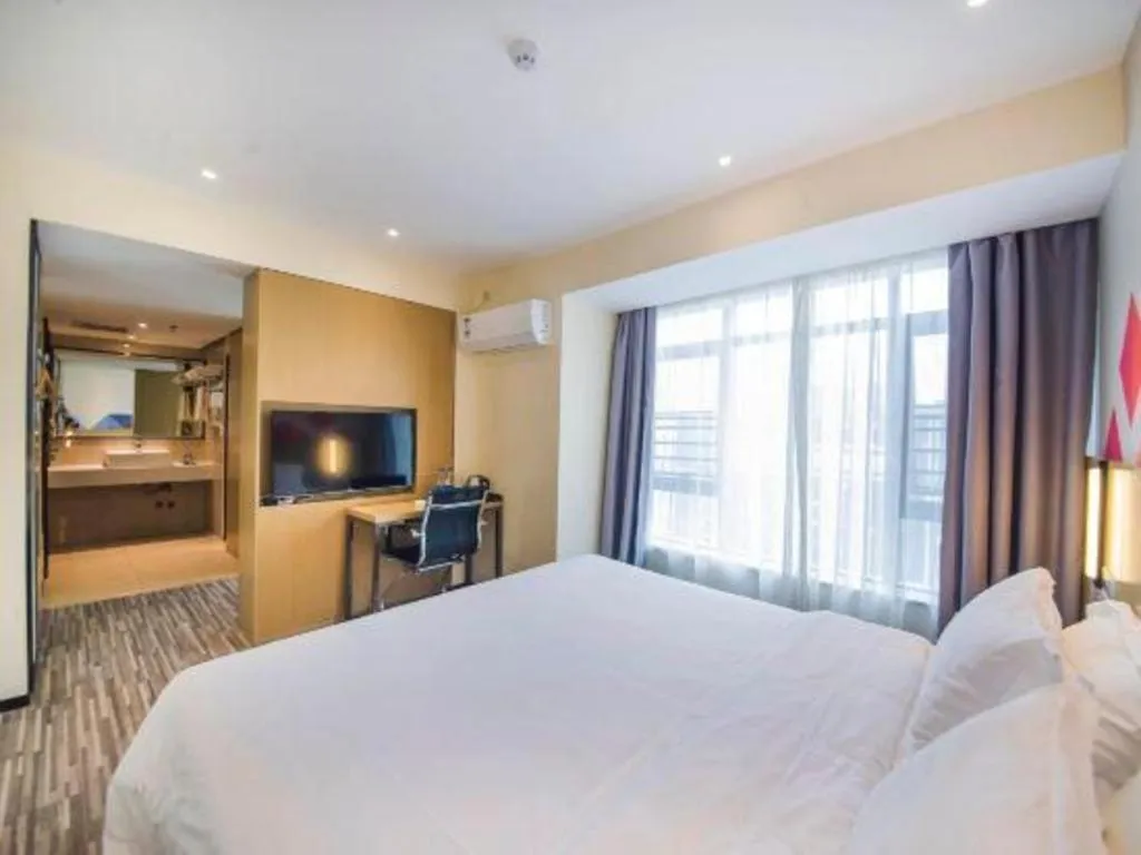 Bed in Borrman Hotel Guilin High-speed Railway North Station Evergrande Plaza