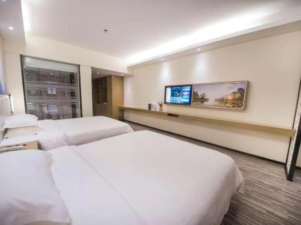 Bed in Borrman Hotel Guilin High-speed Railway North Station Evergrande Plaza