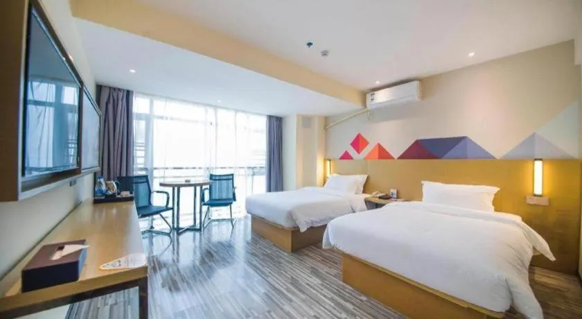 Bed in Borrman Hotel Guilin High-speed Railway North Station Evergrande Plaza