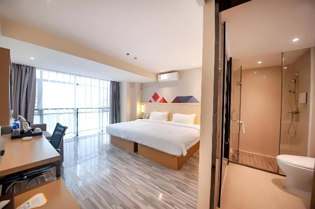 Bed in Borrman Hotel Guilin High-speed Railway North Station Evergrande Plaza