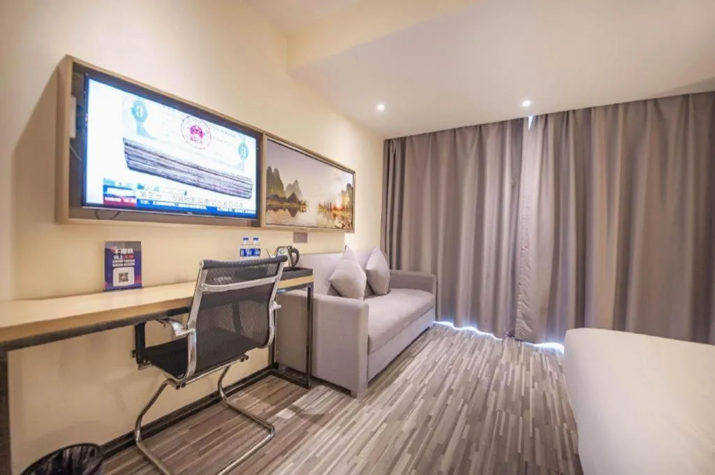 Bed in Borrman Hotel Guilin High-speed Railway North Station Evergrande Plaza