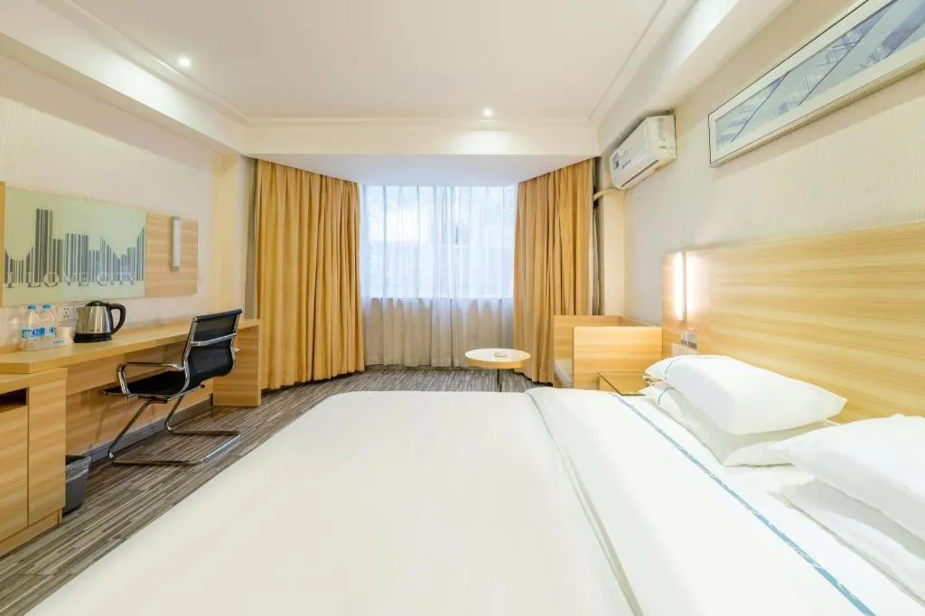 Bed in City Comfort Inn Guangzhou Luyuan Road Taojin Metro Station