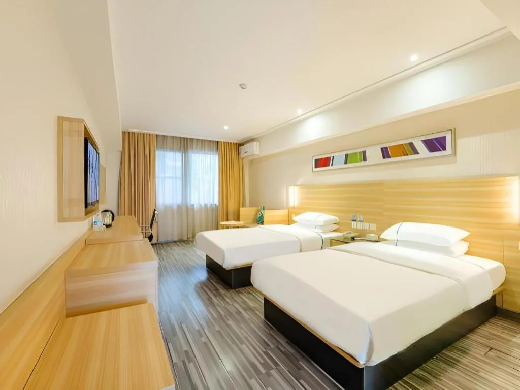 Bed in City Comfort Inn Guangzhou Luyuan Road Taojin Metro Station