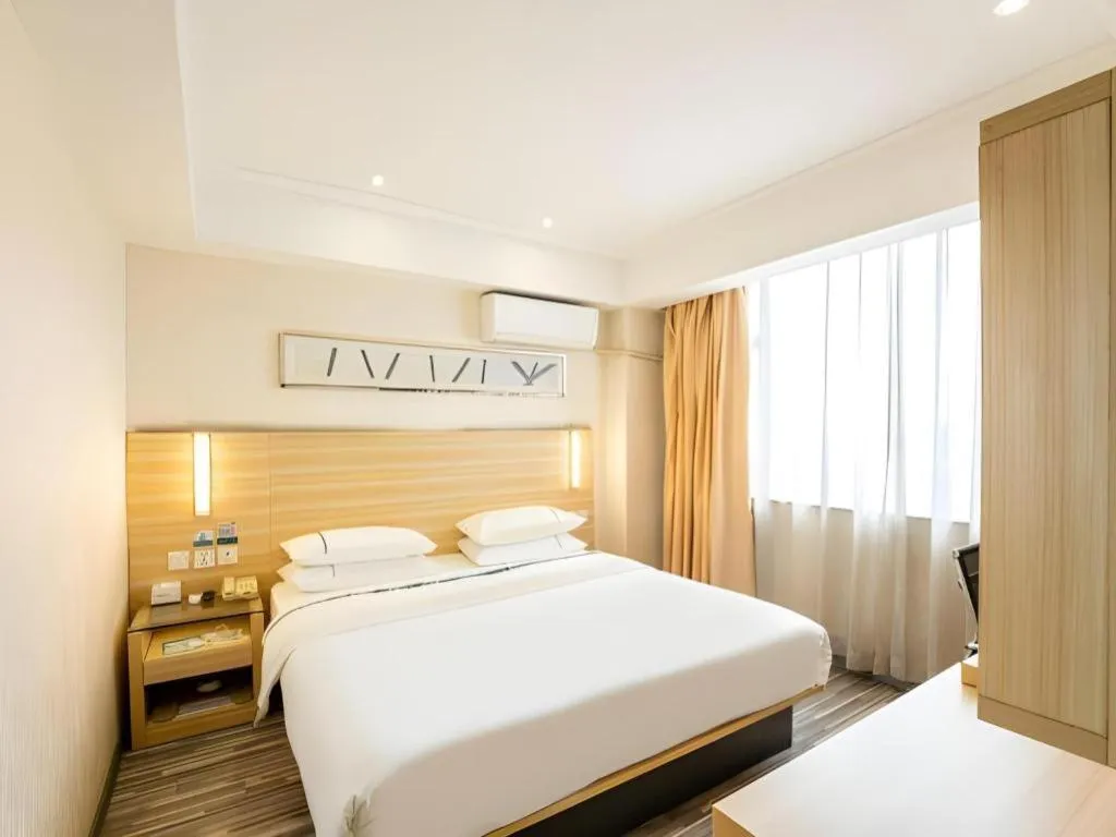 Bed in City Comfort Inn Guangzhou Luyuan Road Taojin Metro Station