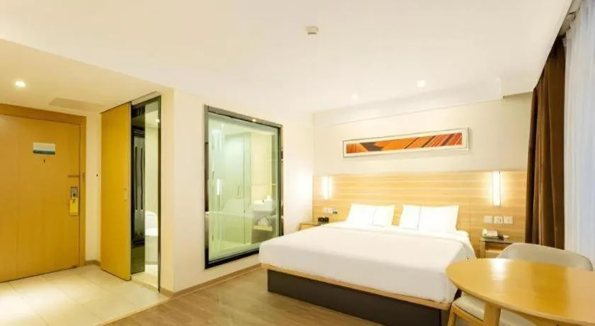 Bed in City Comfort Inn Guangzhou Luyuan Road Taojin Metro Station