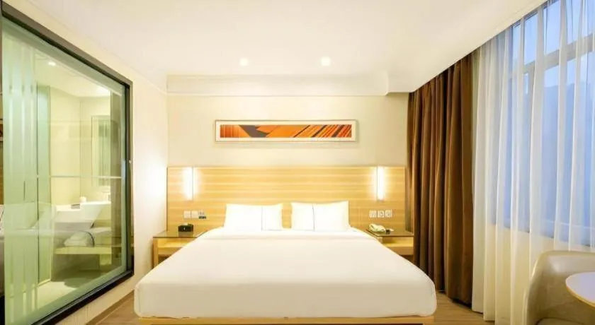 Bed in City Comfort Inn Guangzhou Luyuan Road Taojin Metro Station