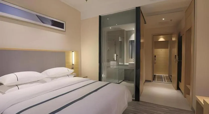 Bed in City Comfort Inn Guangzhou Luyuan Road Taojin Metro Station