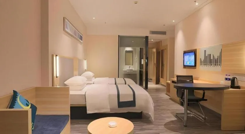 Bed in City Comfort Inn Guangzhou Luyuan Road Taojin Metro Station