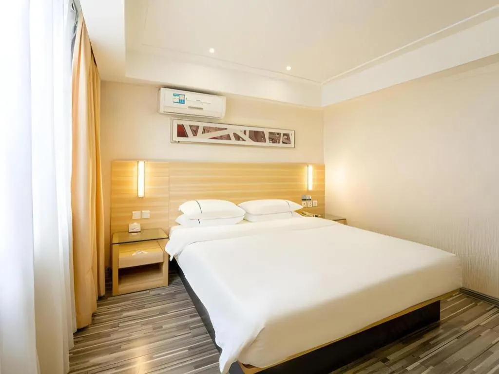 Bed in City Comfort Inn Guangzhou Luyuan Road Taojin Metro Station