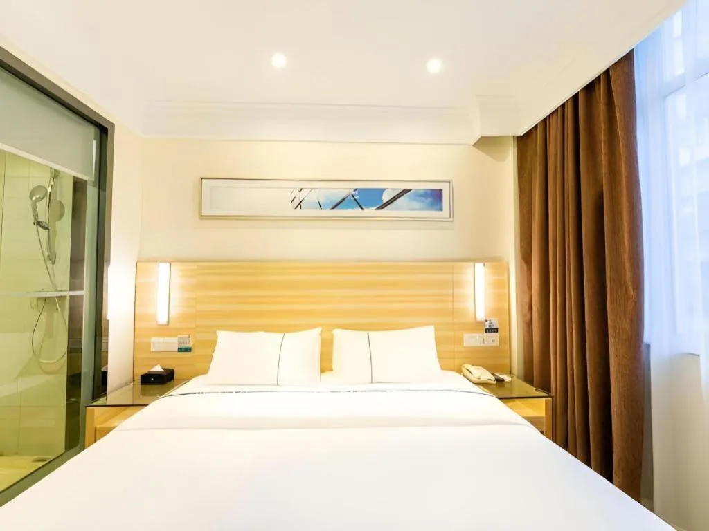 Bed in City Comfort Inn Guangzhou Luyuan Road Taojin Metro Station