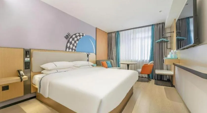 Bed in City Comfort Inn Guangzhou Luyuan Road Taojin Metro Station