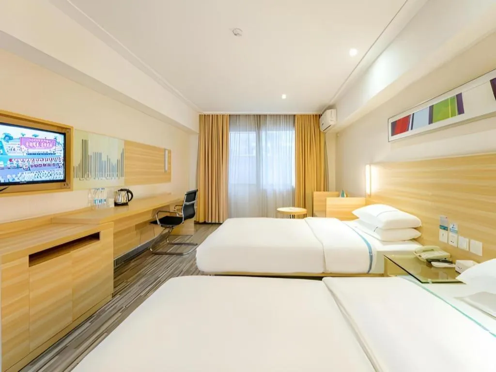 Bed in City Comfort Inn Guangzhou Luyuan Road Taojin Metro Station
