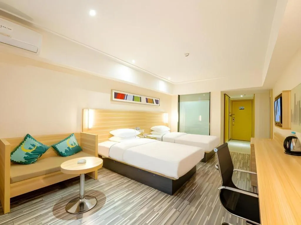 Bed in City Comfort Inn Guangzhou Luyuan Road Taojin Metro Station