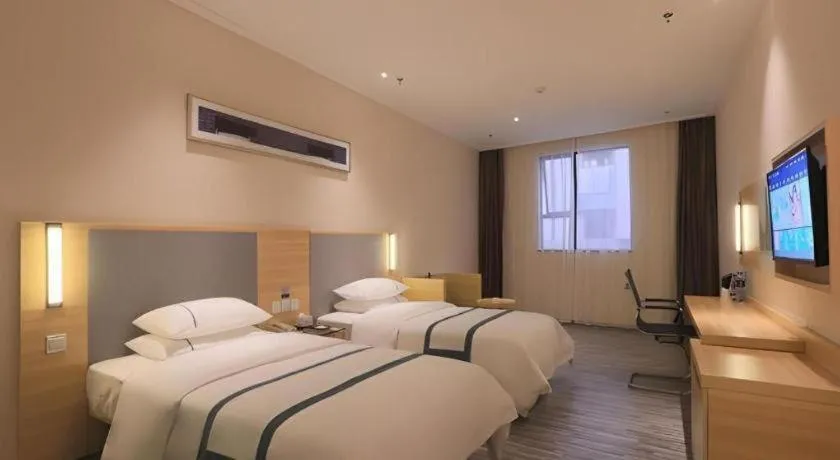 Bed in City Comfort Inn Guangzhou Luyuan Road Taojin Metro Station