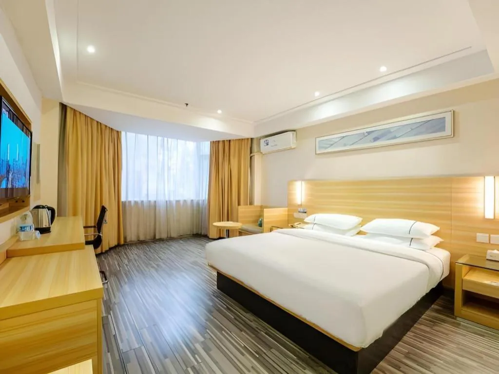 Bed in City Comfort Inn Guangzhou Luyuan Road Taojin Metro Station