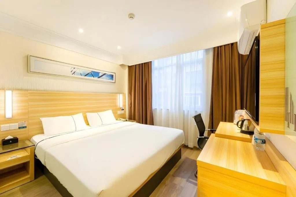 Bed in City Comfort Inn Guangzhou Luyuan Road Taojin Metro Station