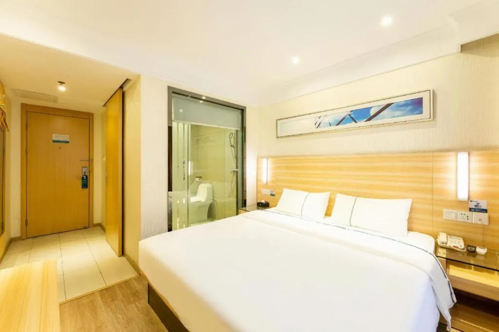 Bed in City Comfort Inn Guangzhou Luyuan Road Taojin Metro Station