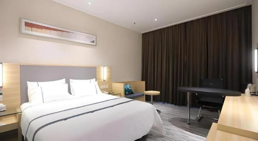 Bed in City Comfort Inn Guangzhou Luyuan Road Taojin Metro Station