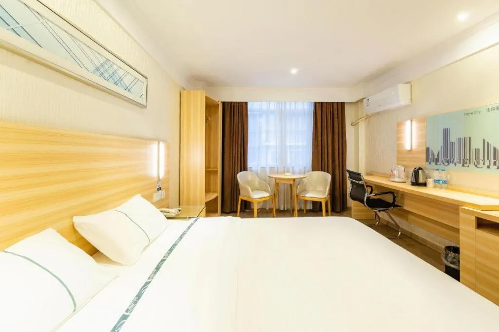 Bed in City Comfort Inn Guangzhou Luyuan Road Taojin Metro Station