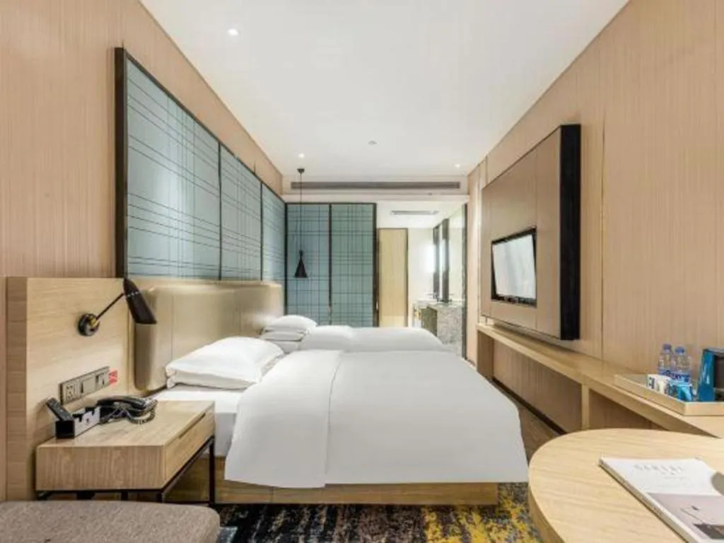 Bed in Echarm Hotel Yiyang Wanda Plaza