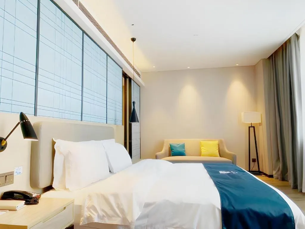 Bed in Echarm Hotel Yiyang Wanda Plaza