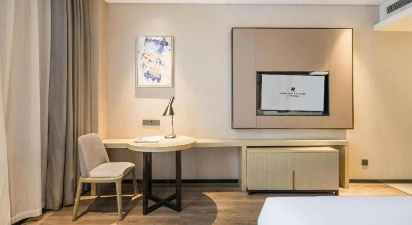 Bed in Echarm Hotel Yiyang Wanda Plaza