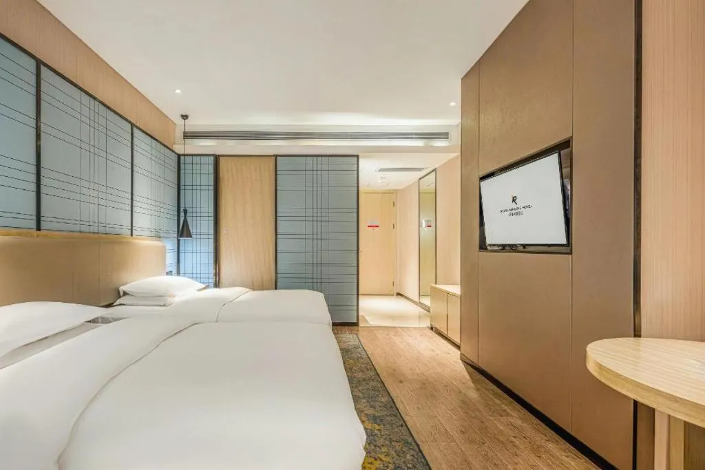 Bed in Echarm Hotel Yiyang Wanda Plaza
