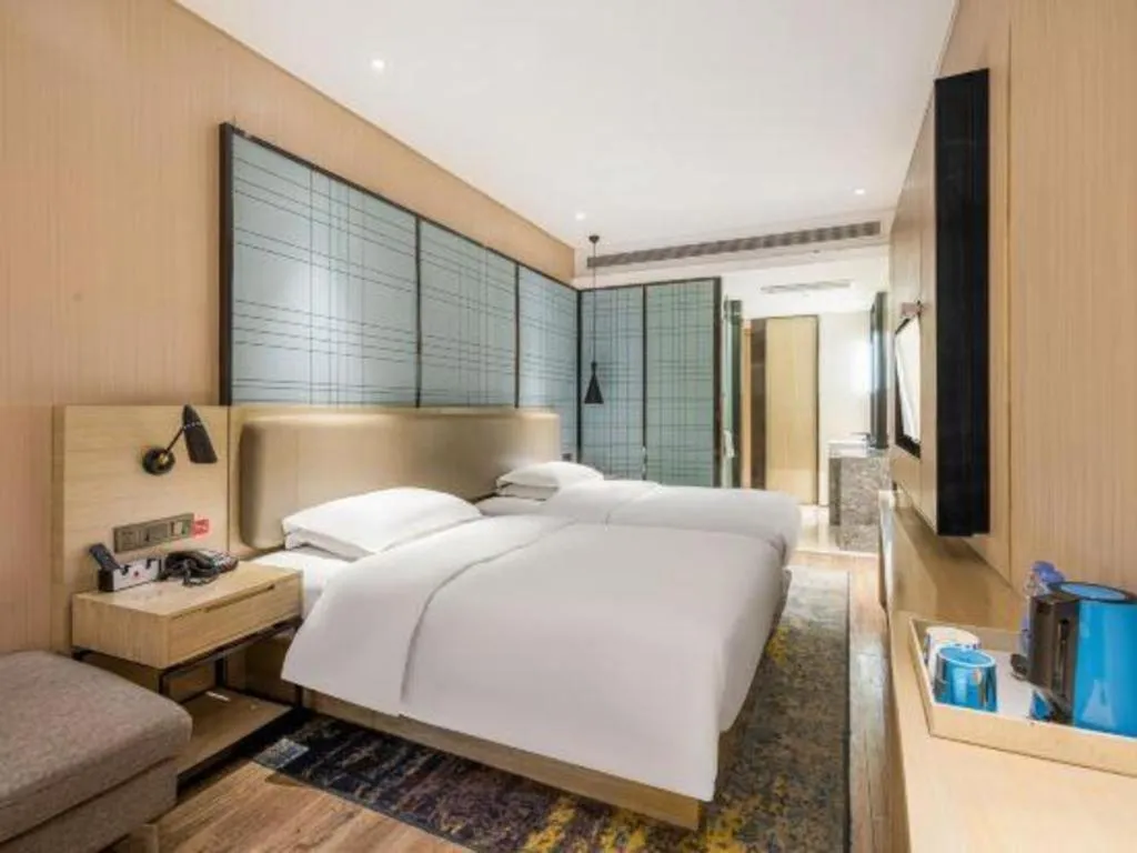 Bed in Echarm Hotel Yiyang Wanda Plaza