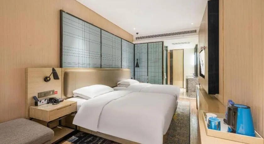 Bed in Echarm Hotel Yiyang Wanda Plaza