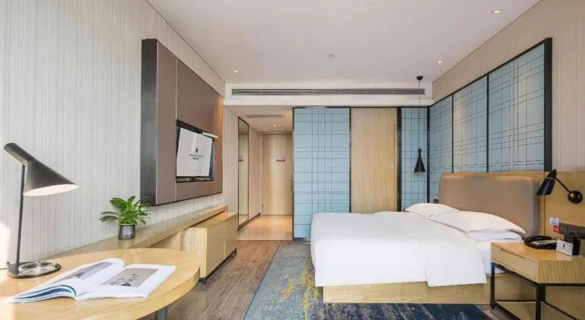 Bed in Echarm Hotel Yiyang Wanda Plaza