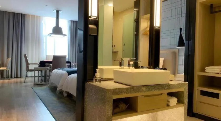 Bed in Echarm Hotel Yiyang Wanda Plaza