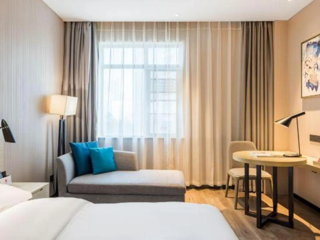 Bed in Echarm Hotel Yiyang Wanda Plaza