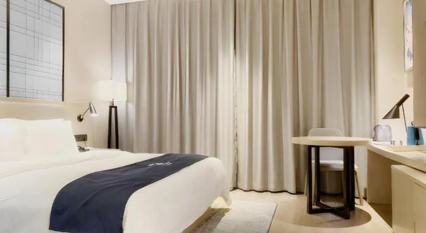 Bed in Echarm Hotel Yiyang Wanda Plaza