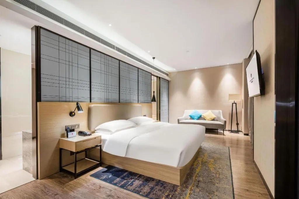 Bed in Echarm Hotel Yiyang Wanda Plaza