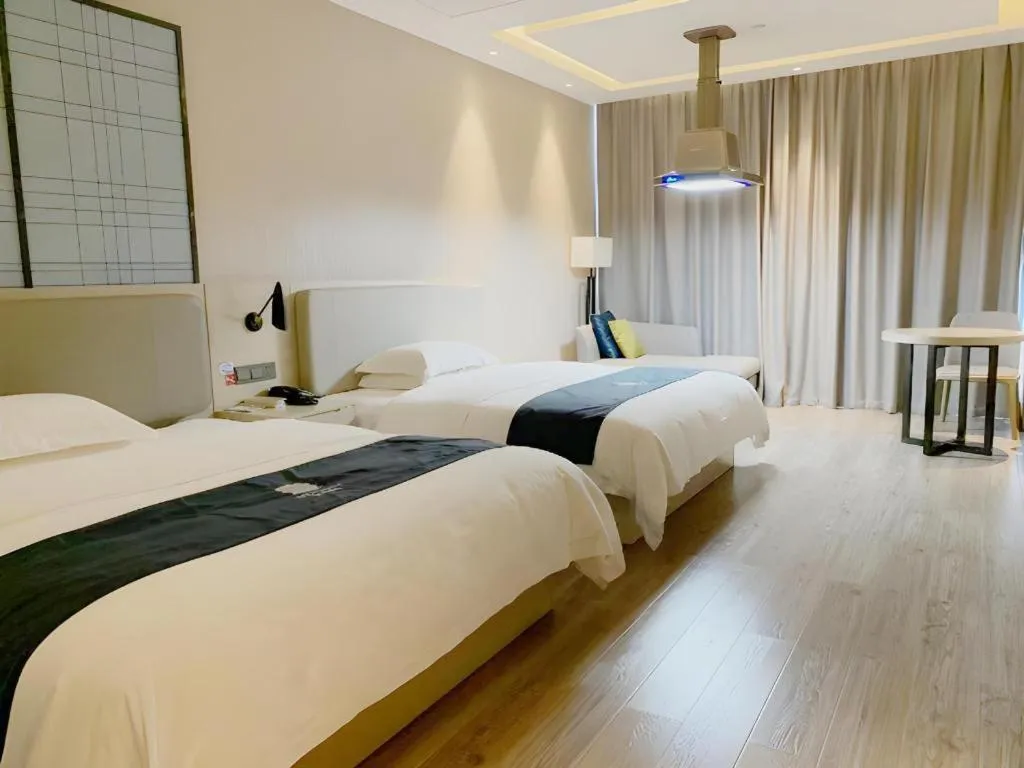 Bed in Echarm Hotel Yiyang Wanda Plaza