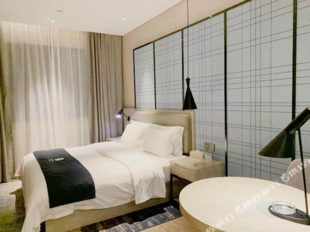 Bed in Echarm Hotel Yiyang Wanda Plaza