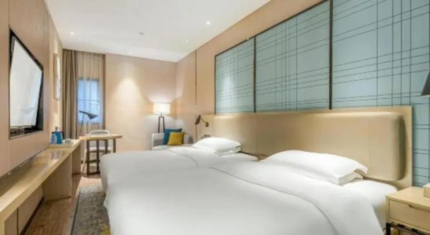 Bed in Echarm Hotel Yiyang Wanda Plaza