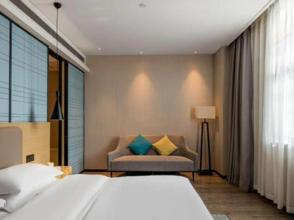 Bed in Echarm Hotel Yiyang Wanda Plaza