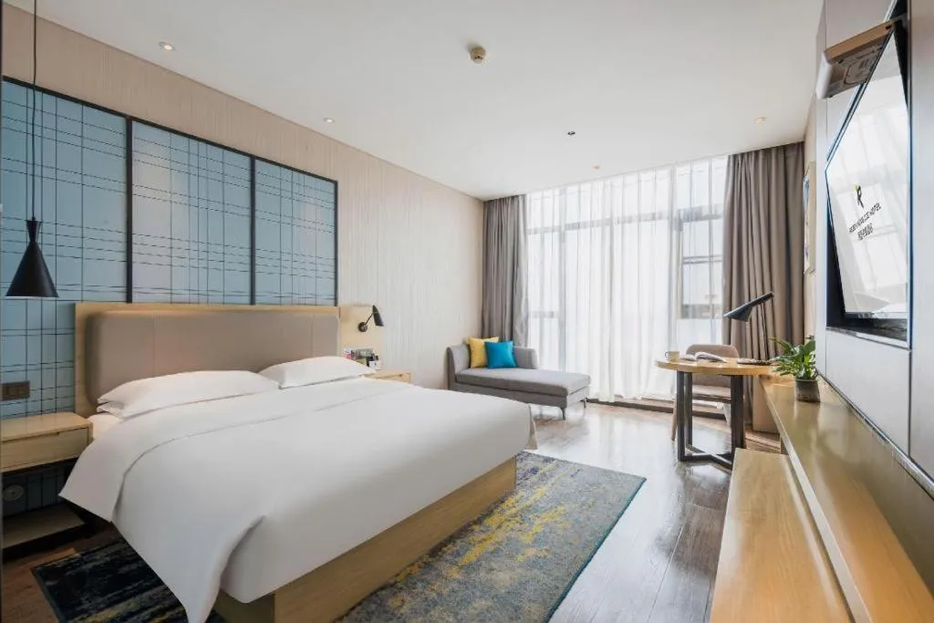 Bed in Echarm Hotel Yiyang Wanda Plaza