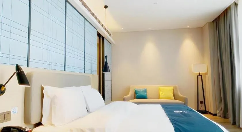 Bed in Echarm Hotel Yiyang Wanda Plaza