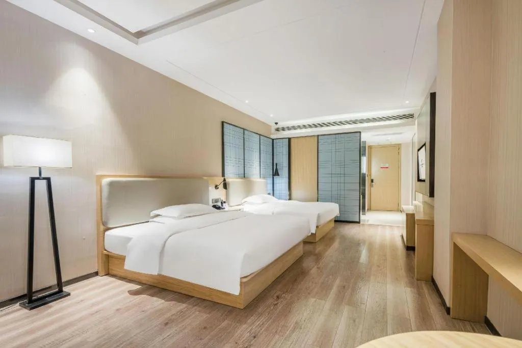 Bed in Echarm Hotel Yiyang Wanda Plaza