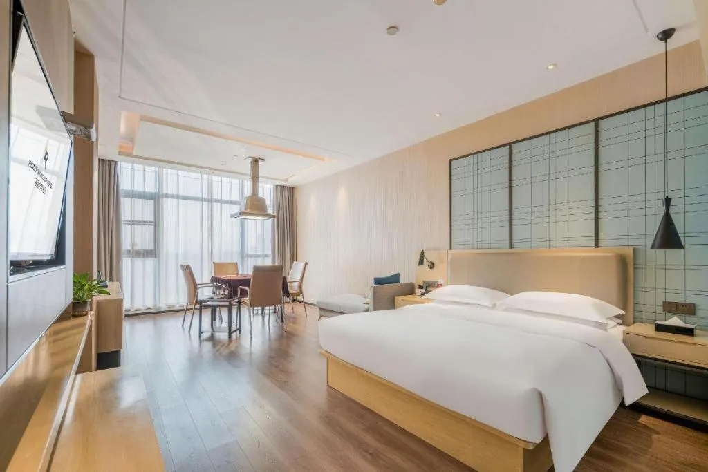 Bed in Echarm Hotel Yiyang Wanda Plaza