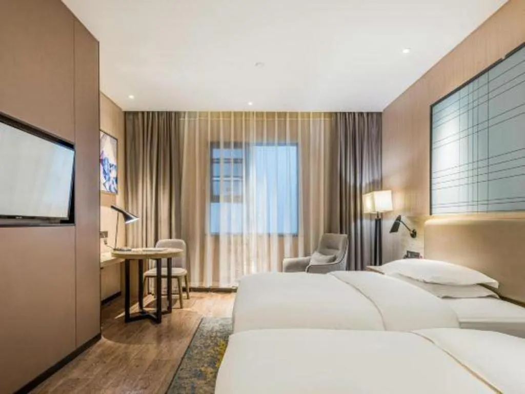 Bed in Echarm Hotel Yiyang Wanda Plaza