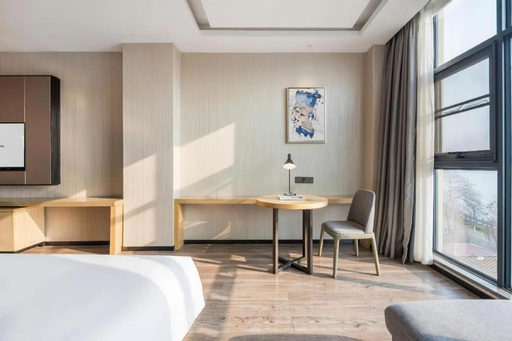 Bed in Echarm Hotel Yiyang Wanda Plaza