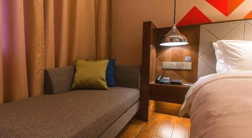 Bed in Borrman Hotel Qianjiang High-speed Railway Station Lobster City