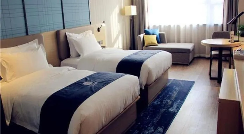 Bed in Echarm Hotel Xian Ming City Wall South Gate