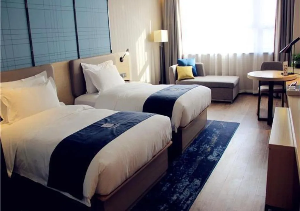 Bed in Echarm Hotel Xian Ming City Wall South Gate