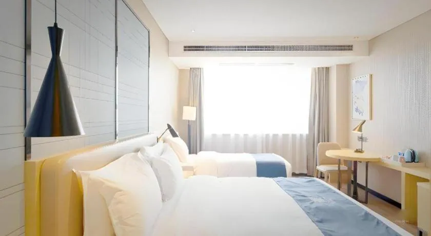 Bed in Echarm Hotel Xian Ming City Wall South Gate