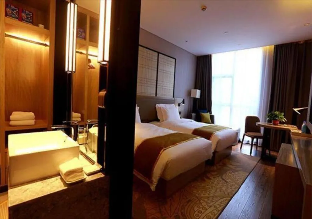 Bed in Echarm Hotel Changsha Gaoqiao